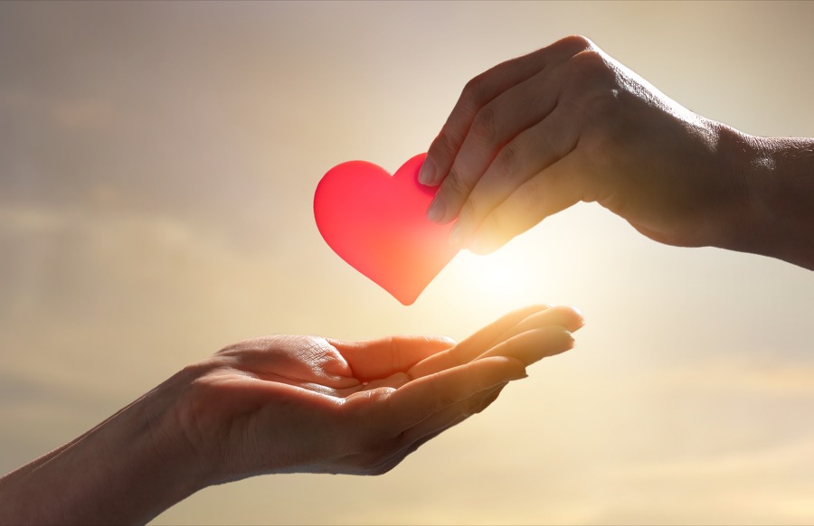 A heart held in open hands